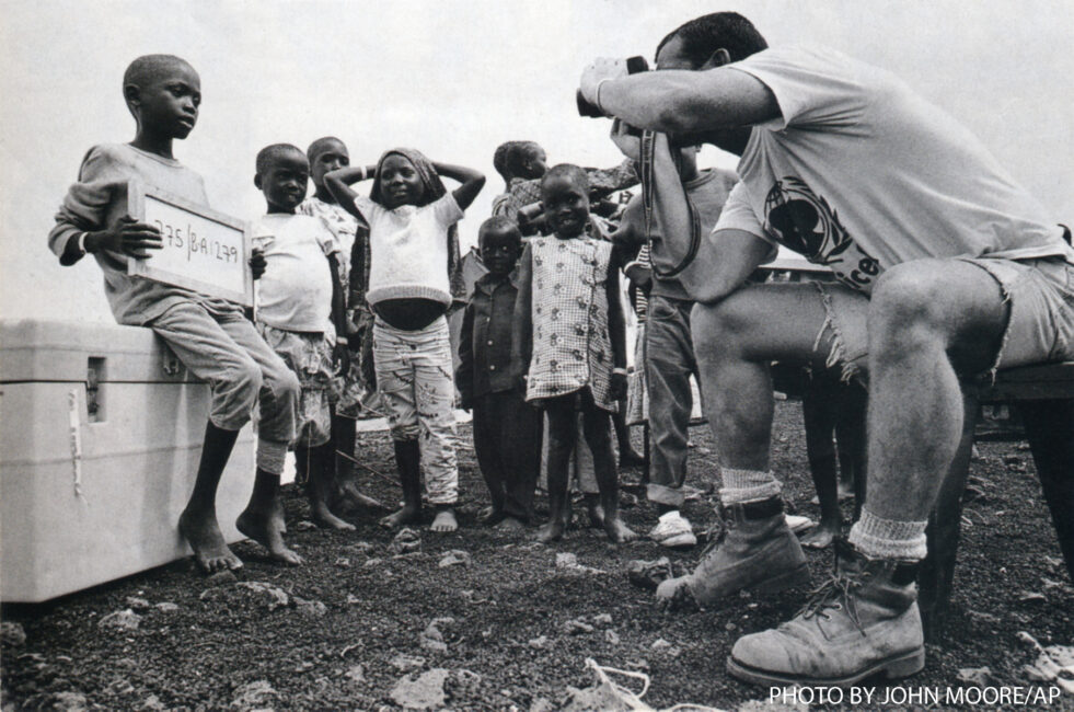 Seamus Conlan started a tracing program to help reunite lost children in Rwanda. After a year he had photographed over 21,000 children with the help of the Red Cross ICRC and Unicef